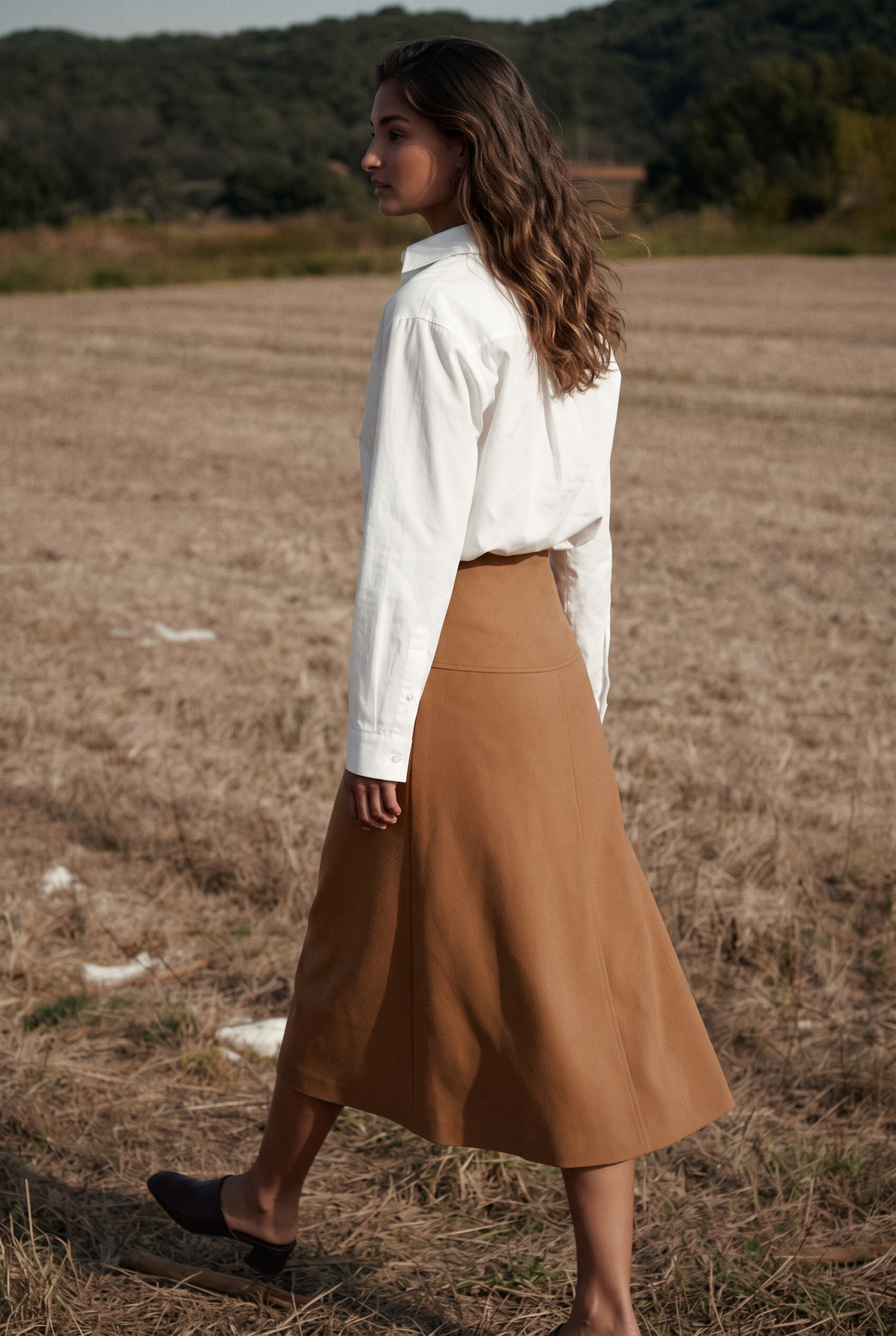 The Ivy Blouse in White, walking