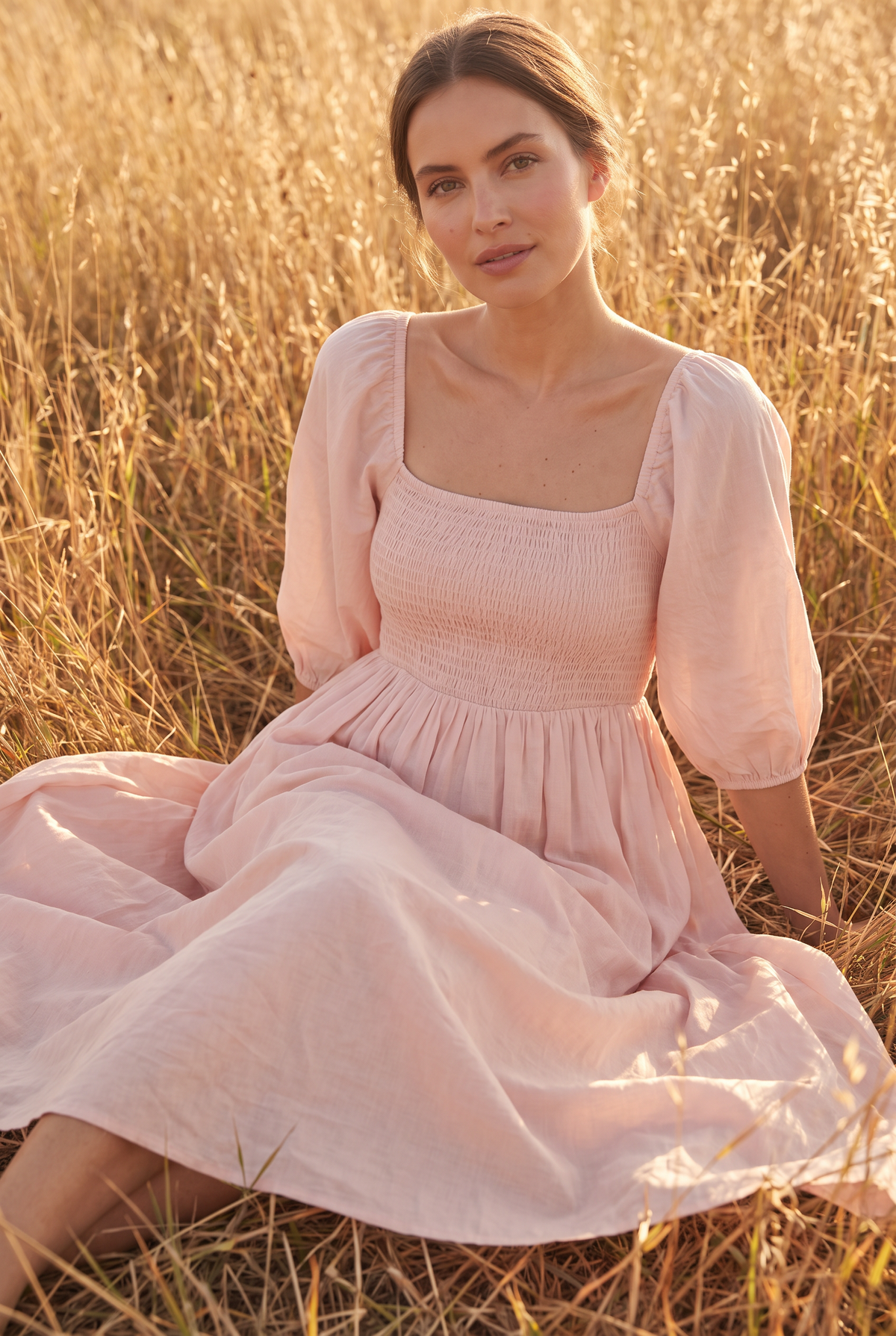 The Linden Midi in Blush, seated