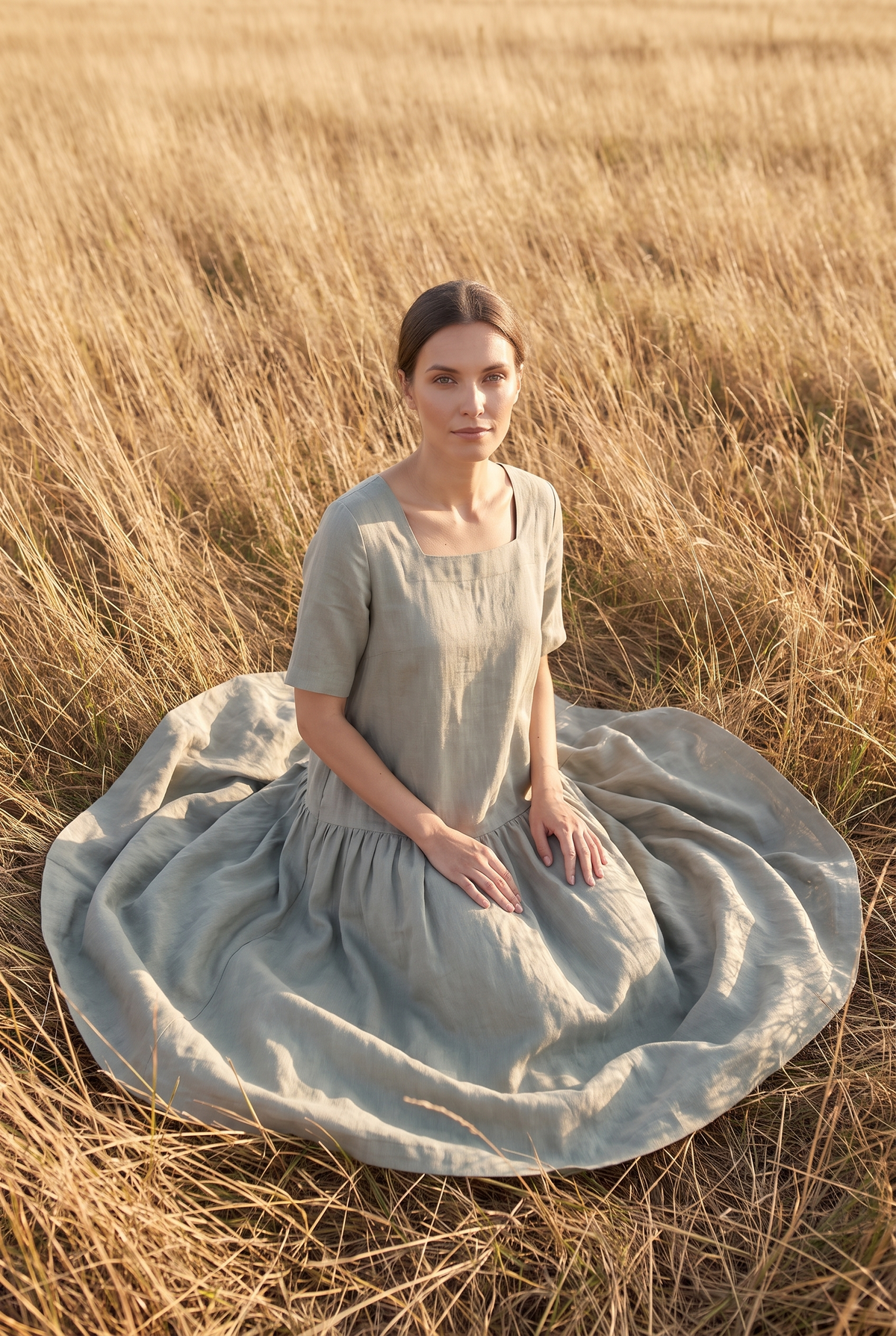The Verity Midi in Sage, seated