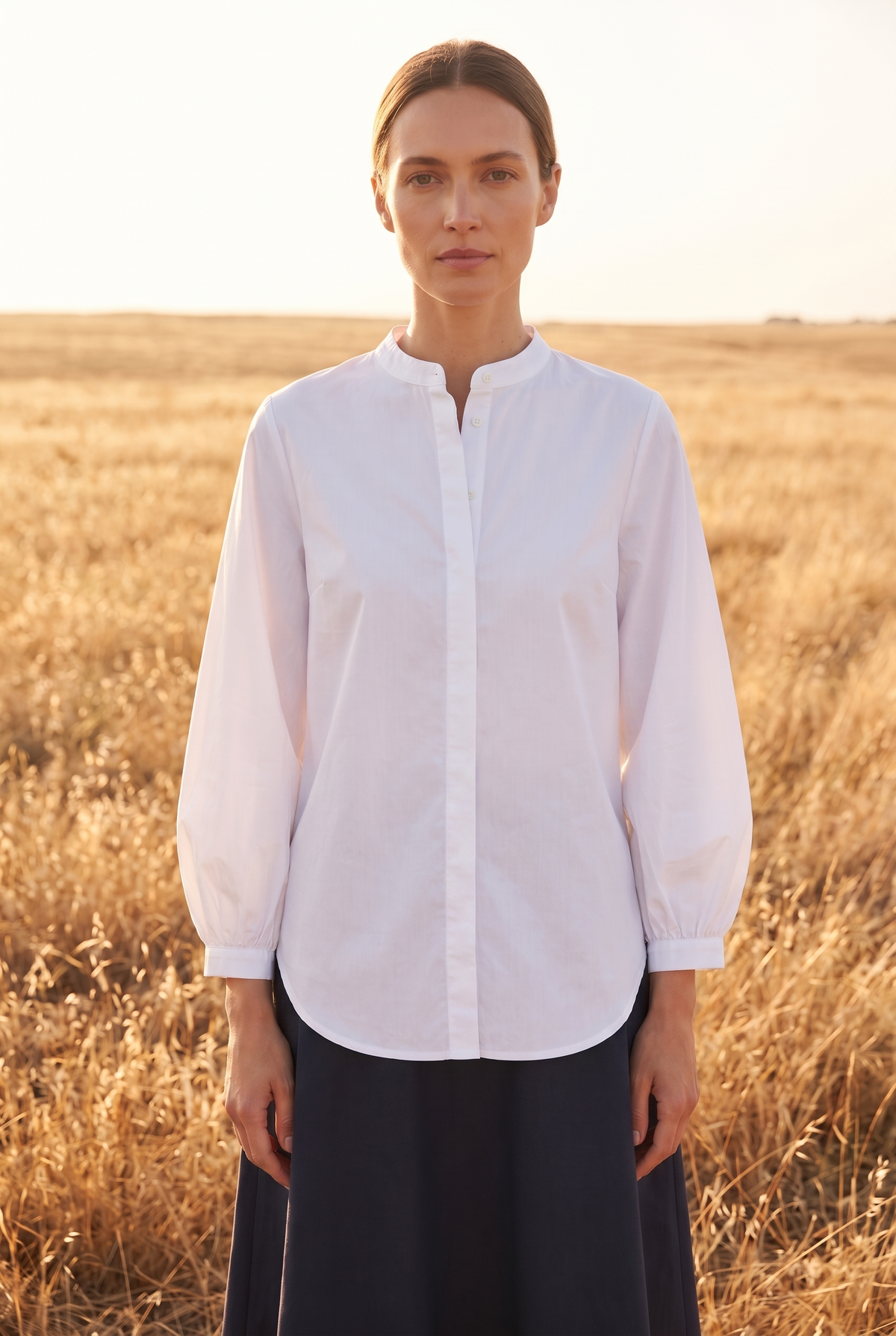 The Bramble Blouse in White, walking