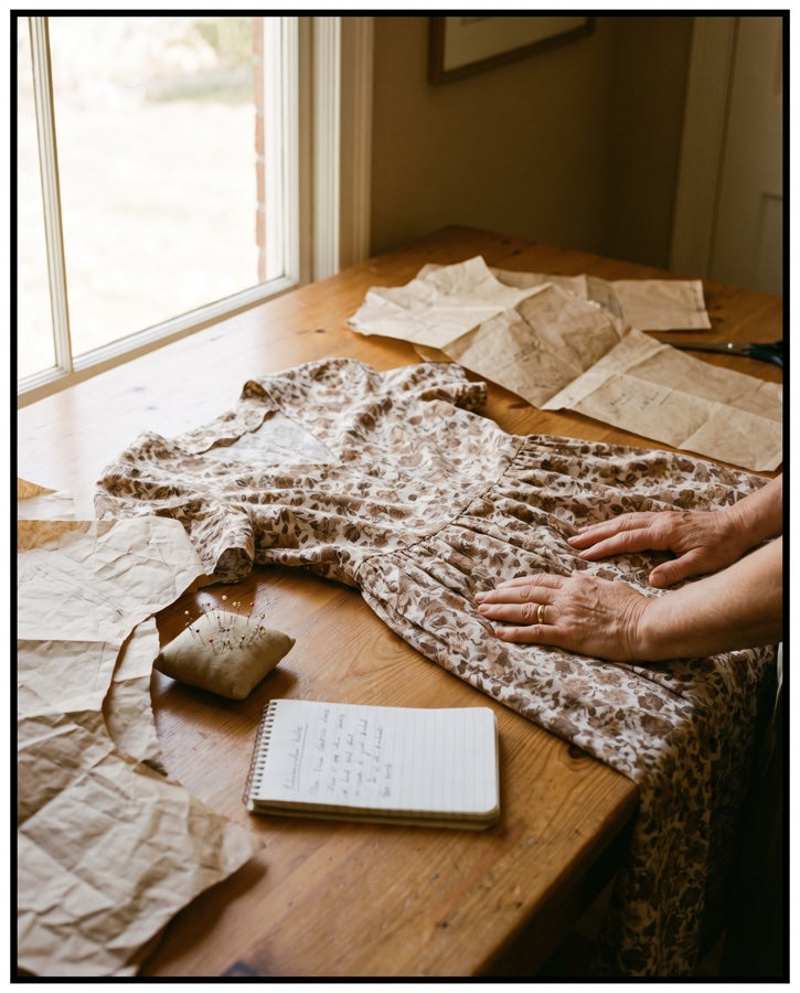 A half finished cotton dress on a dressmaker's table